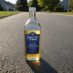 vinaigre blanc sur goudron